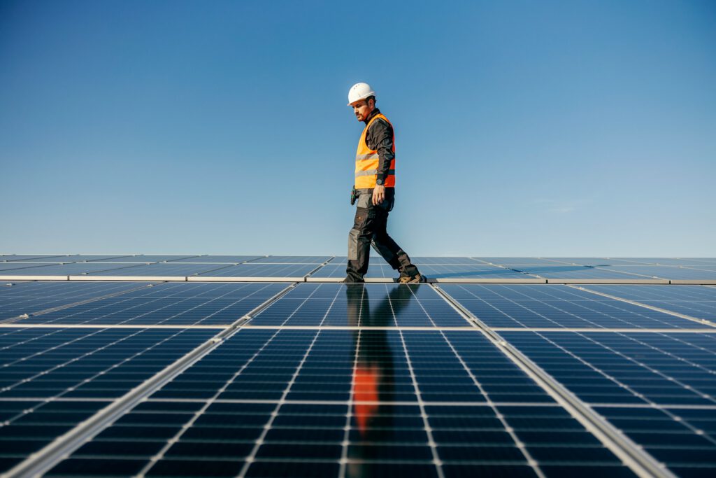 Worker On Solar Panels